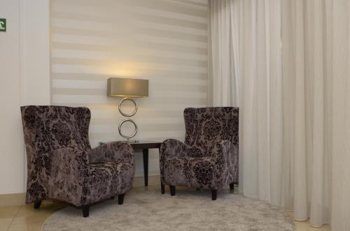 Posezení v ubytování Hotel Cinquentenario & Conference Center