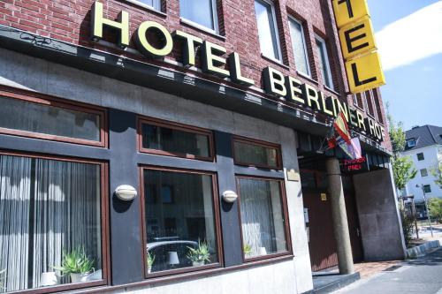 a hotel berlin sign on the side of a building at Hotel Berliner Hof in Düsseldorf