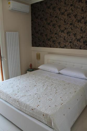Кровать или кровати в номере Dafne Holiday