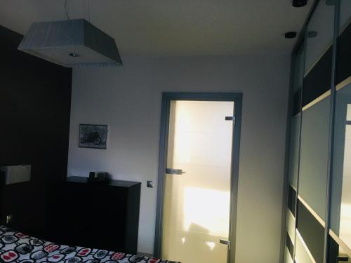 Łóżko lub łóżka w pokoju w obiekcie Apartament Ala