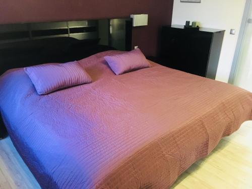 Łóżko lub łóżka w pokoju w obiekcie Apartament Ala