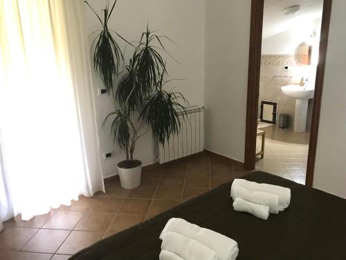 Postel nebo postele na pokoji v ubytování Villa Laregina