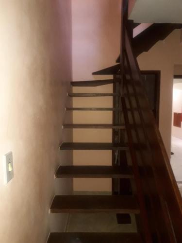 a staircase in a house with smoke coming down it at Edificio caminho do sol in Arraial do Cabo