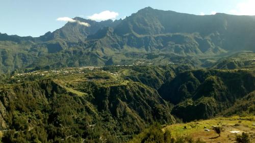 a mountain view of a valley in the mountains at Auberge du Cap in Cilaos