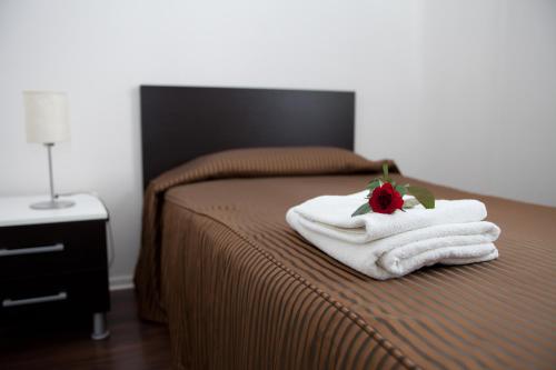 Katil atau katil-katil dalam bilik di Levidom Residence Rooms