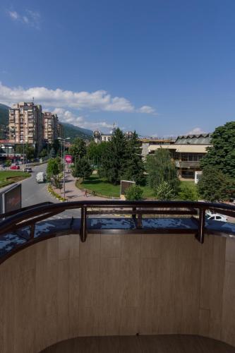 a skateboard ramp with a view of a city at Hotel Lirak in Tetovo