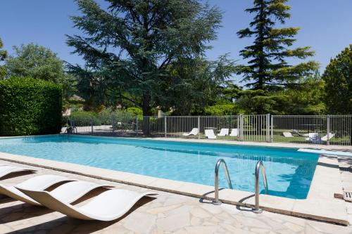 Πισίνα στο ή κοντά στο Logis Hôtel Castel Mouisson