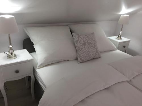 Кровать или кровати в номере Gästehaus Paulina
