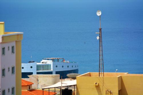 a view of the ocean from the roof of a building at Sol Hotel in Praia