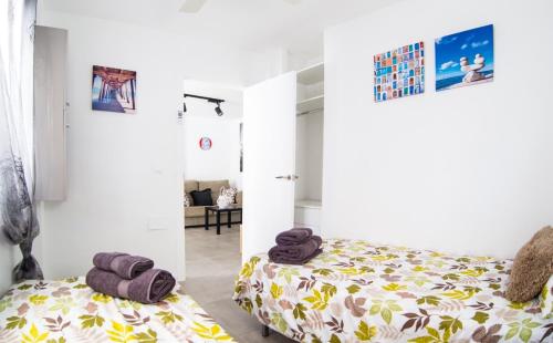 Postelja oz. postelje v sobi nastanitve Apartamento Playa Bonita