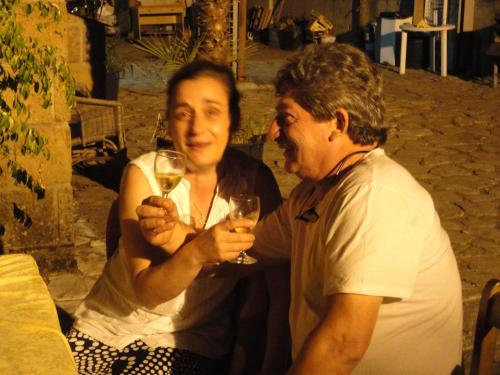 a man and a woman holding glasses of wine at Tenuta Montelaura in Forino