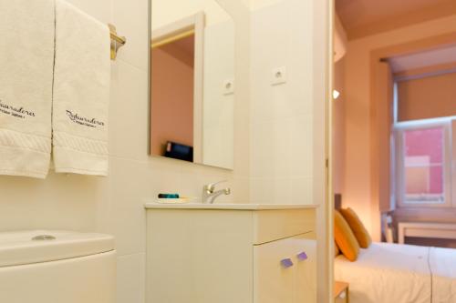 Et badeværelse på Inn-Chiado Restauradores Prime Suites