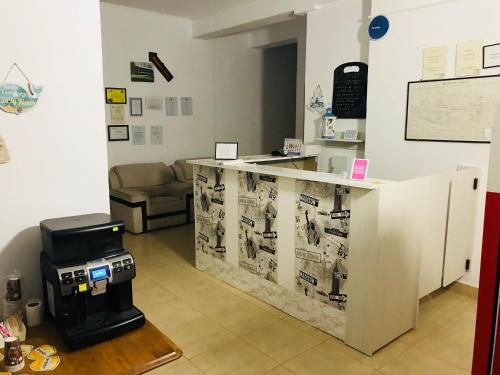 a sewing room with a machine on a counter at Perla in Costinesti