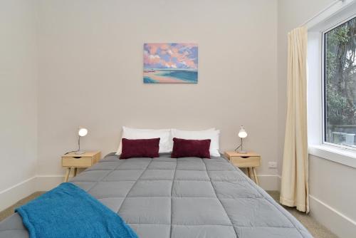מיטה או מיטות בחדר ב-Albemarle Villa - Christchurch Holiday Homes