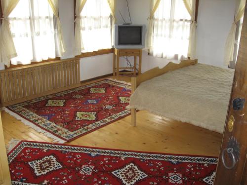 Ένα ή περισσότερα κρεβάτια σε δωμάτιο στο Sava Cupetsa Guest House