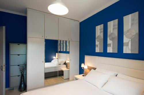 Voodi või voodid majutusasutuse Corfu City Design Residence toas