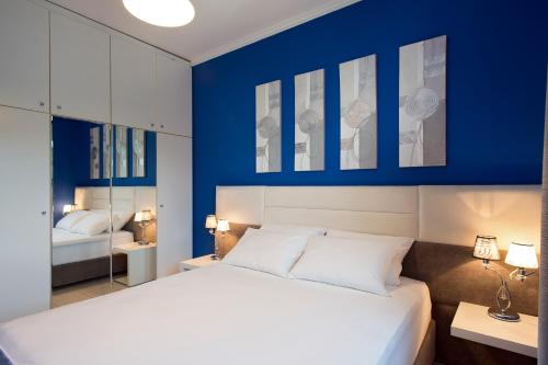 Voodi või voodid majutusasutuse Corfu City Design Residence toas