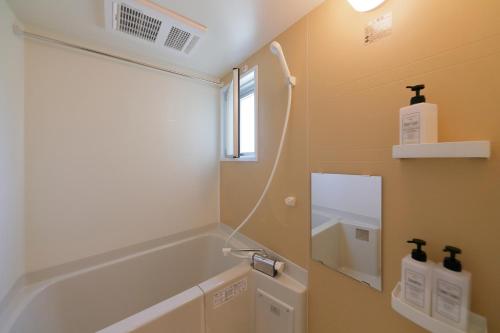 Ванная комната в HOTEL LANDMARK NAMBA(E)