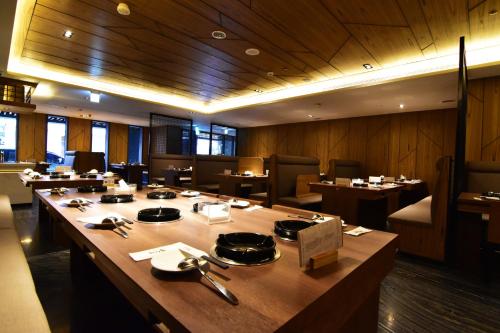Un restaurante o sitio para comer en Hotel Midtown Richardson - Kaohsiung Bo'ai