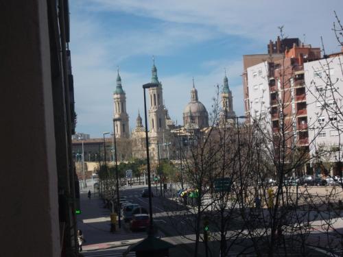 a view of a city with tall buildings at Hostal Cumbre in Zaragoza