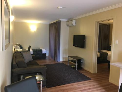 TV o dispositivi per l'intrattenimento presso The Peninsula Riverside Serviced Apartments