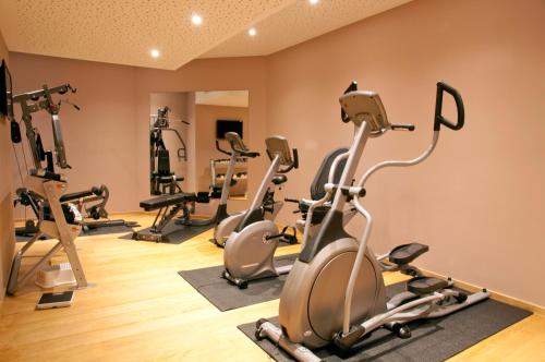 a row of exercise bikes in a gym at Hotel Rosatsch in Pontresina