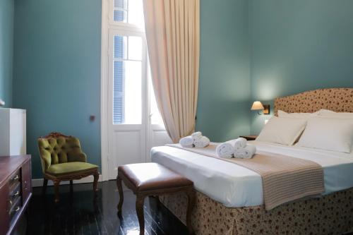Ένα ή περισσότερα κρεβάτια σε δωμάτιο στο alegra#1 historic center Thessaloniki