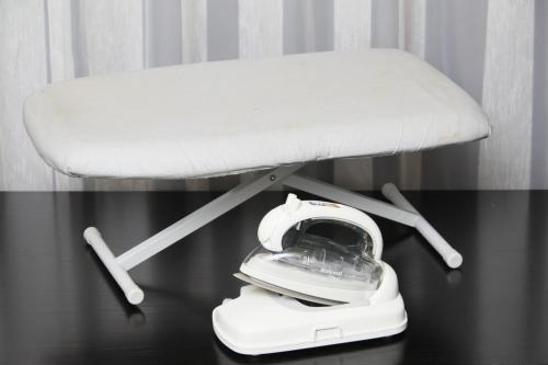 a white chair sitting on top of a table at Richmond Hotel Higashi Osaka in Osaka