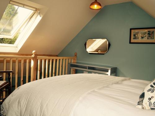 a bedroom with a bed and a window at The Blackboys Inn in Framfield