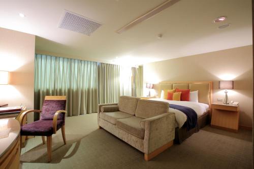 Katil atau katil-katil dalam bilik di Jin Hua Hotel