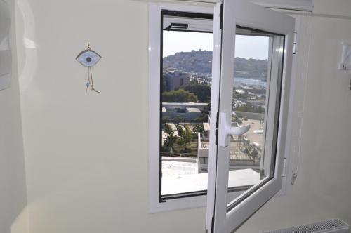 a window in a room with a view at Diamond View in Kavala