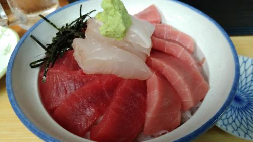a bowl of food with watermelon and other foods at EMS Enoshima クラシックゲストハウス 寝室は個室 犬OK in Fujisawa