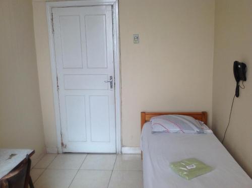 Postel nebo postele na pokoji v ubytování Hotel Chaves - Quartos Individuais