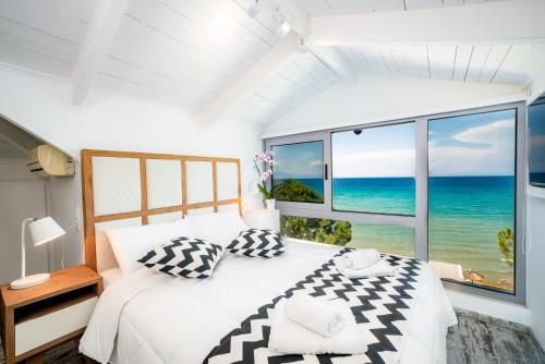 Posteľ alebo postele v izbe v ubytovaní Sunrise Rent Rooms