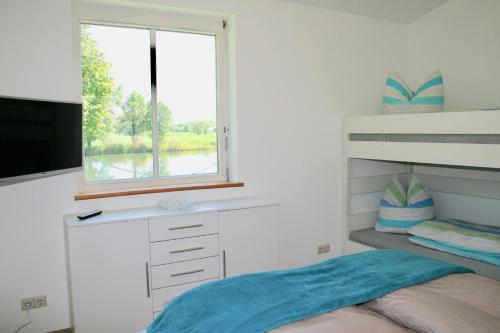 Postel nebo postele na pokoji v ubytování Gästehaus Gaumenflug am See