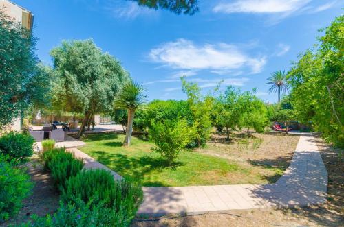 a park with trees and a pathway at Hort de Can Bou in Porreres