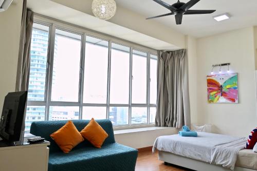 Ένα ή περισσότερα κρεβάτια σε δωμάτιο στο Parkview KLCC Serviced Suites