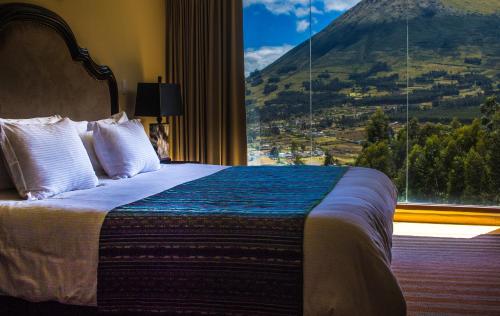 Cama o camas de una habitación en Hotel Medina Del Lago