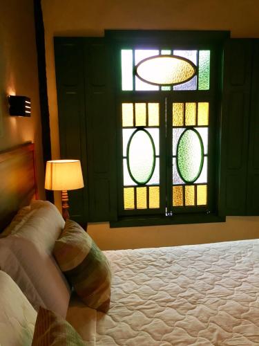 Ένα ή περισσότερα κρεβάτια σε δωμάτιο στο Hotel Santa Esmeralda
