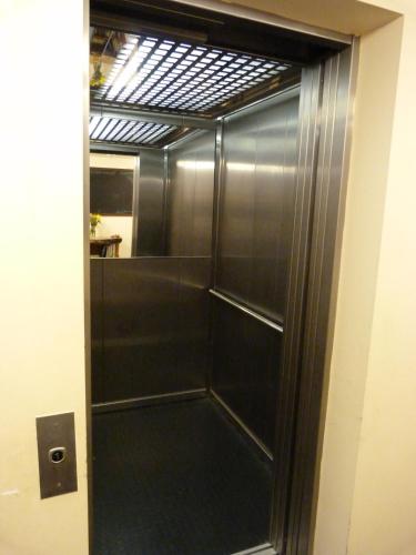 a shower stall with a glass door in a room at Cameley Lodge - Self Catering in Temple Cloud
