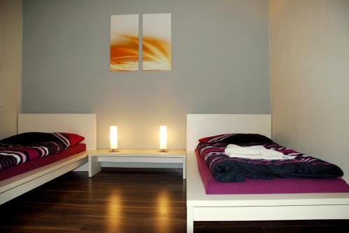 מיטה או מיטות בחדר ב-Hotel Helada