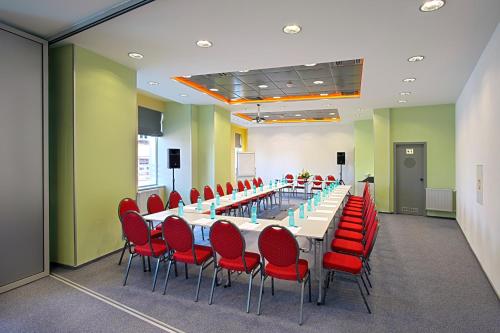 Der Geschäftsbereich oder Konferenzraum in der Unterkunft Hotel Ambient