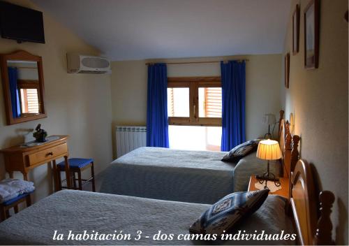 Voodi või voodid majutusasutuse Casa Dueso toas