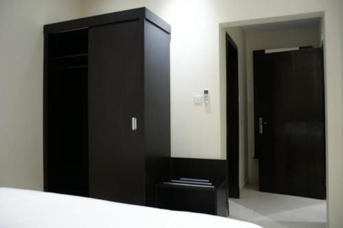 MJ Apartmentsにあるベッド