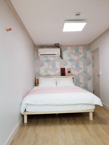 Letto o letti in una camera di Dal Garam Guesthouse - 외국인 전용