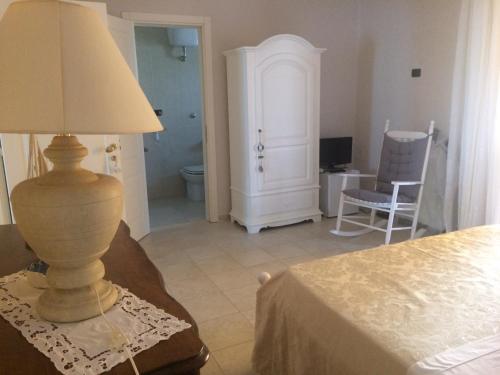 Katil atau katil-katil dalam bilik di B&B PESCIOLINO ROSSO