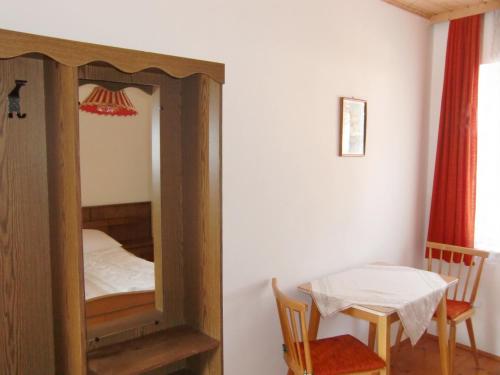 Postel nebo postele na pokoji v ubytování Mitschighof - Apartments und Pension - Heidis-Welt, Mitschig