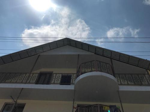 a building with a fire escape on top of it at GuestHouse M22 in Dilijan
