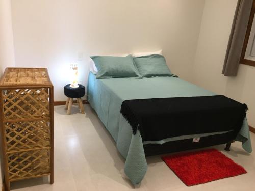 Кровать или кровати в номере Residencial Villa da Lua