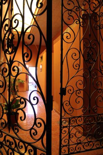an open door with a view of a hallway at Casona de Sillar in Arequipa